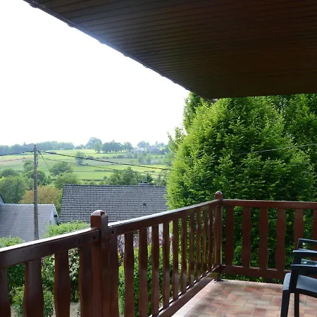House With Beautiful Wooden Balcony Located Against The Hills * Ondenval