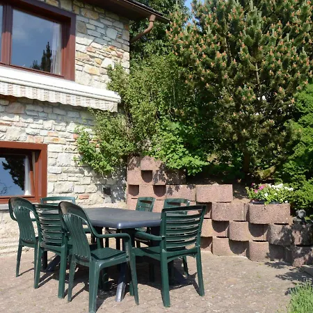 House With Beautiful Wooden Balcony Located Against The Hills Hébergement de vacances Ondenval
