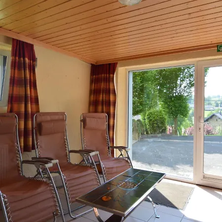 House With Beautiful Wooden Balcony Located Against The Hills Hébergement de vacances Ondenval